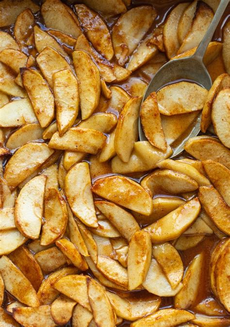 Dip the donuts in the melted butter, then dunk into the cinnamon sugar mixture coating all sides. Baked Cinnamon Apples - A Saucy Kitchen