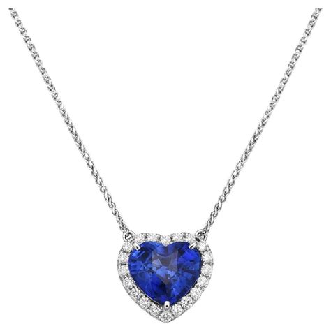 1231 Carat Heart Shaped Yellow Sapphire And Diamond Platinum Pendant