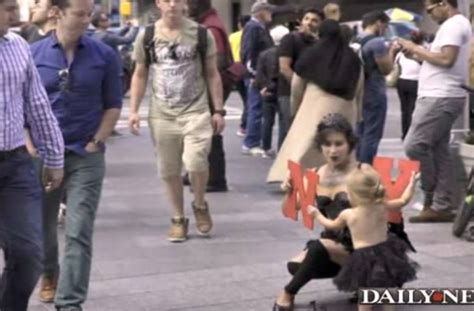 Mother Brings Topless 2 Year Old Daughter To Panhandle Around Times Square