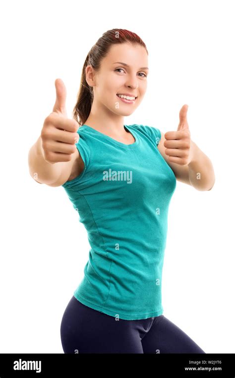 Slim And Fit You Should Try It Beautiful Smiling Young Girl In Fitness Clothes Giving Thumbs