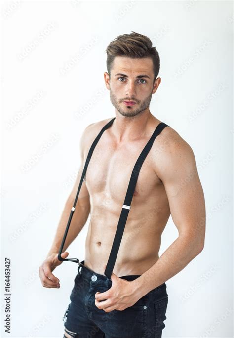 Sexy Muscular Shirtless Man In Suspenders Stock Photo Adobe Stock