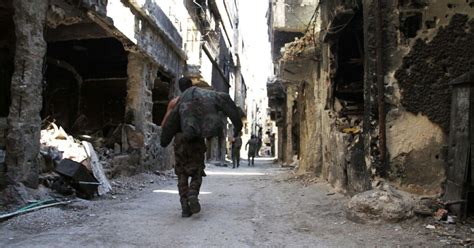 Syrian Bombing Worsens Damascus Camp Crisis Amid Clashes