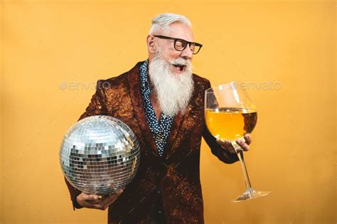 Senior Party Man Celebrating New Years Eve In Disco Club Stock Photo