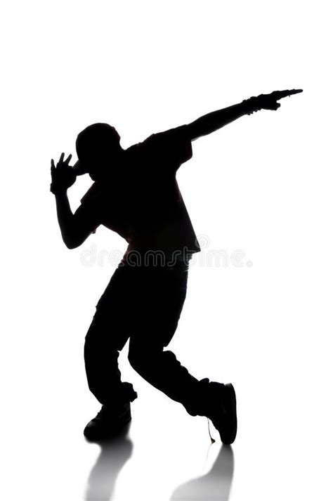 The Silhouette Of A Man With His Arms Outstretched