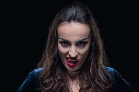 Dreadful Vampire Showing Her Fangs And Looking Free Stock Photo And Image