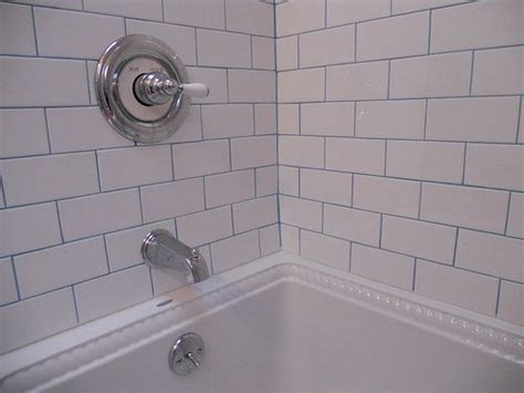 When it comes to fitting flooring and tiles, grout is absolutely essential. White tiles, blue grout...fabulous! | Large tile bathroom ...