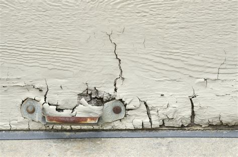 What To Do If One Of The Panels Of Your Garage Door Becomes Cracked