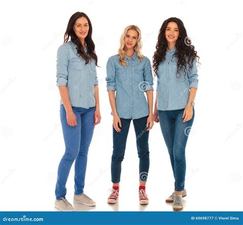 Three Young Casual Women In Jeans Clothes Standing Together Stock Image