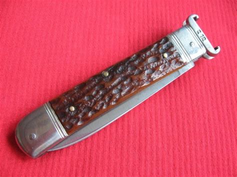 Vintage Solingen Germany Shell Puller Bone Switchblade Knife