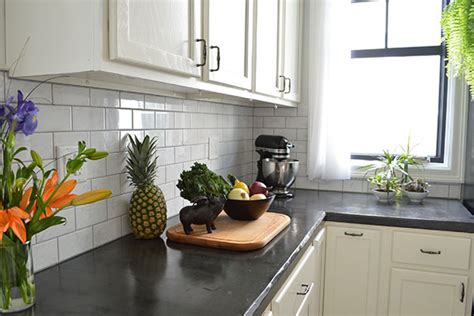 Here's another beautiful wood countertop that you should consider making for your kitchen countertop. Remodelaholic | DIY Concrete Countertop Reviews