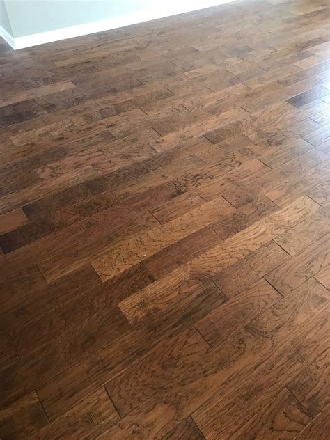 Hardwood costs more than laminate but is similar in price to engineered wood. ENGINEERED HARDWOOD, HARTLEY HICKORY, GOLDEN HICKORY ...