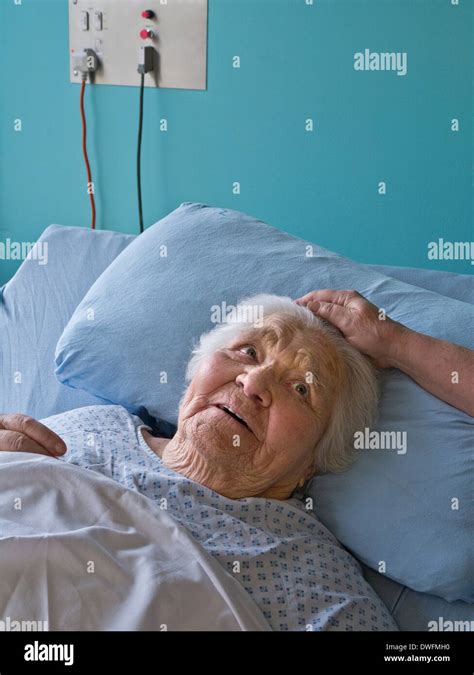 Elderly Hospital Bed Stock Photos And Elderly Hospital Bed Stock Images