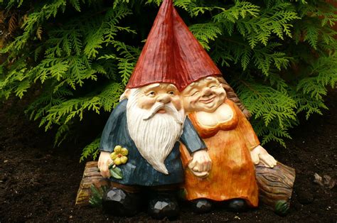 Woodland Gnome Couple Sitting On Log Gnomes Cone Hat 13 In Wide X 13 In