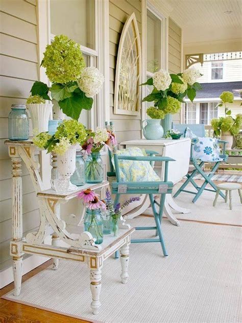 Shabby Chic Porch With Antique White And Aquateal Painted Furniture It