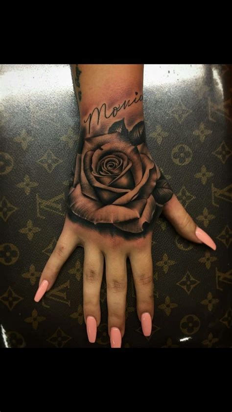A rose tattoo on your hand is a sign that you're not afraid of pain or a challenge and love welcoming new experiences, including a stunning new tattoo that takes up most of your hand. Pin by infinitikash 🍯 on Tattoos & piercings | Hand ...