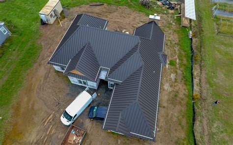 New Construction Residential Home With Aluminium Charcoal Grey Roof