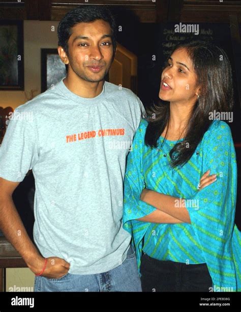Indias First Formula One Driver Narain Karthikeyan And His Wife Pavarna Show Up In A Pool