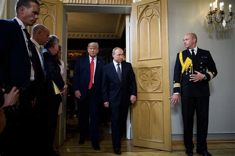 in pictures trump meets with putin