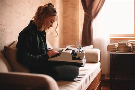 Young Writer Using Typewriter At Home Stock Photo Image Of Paper