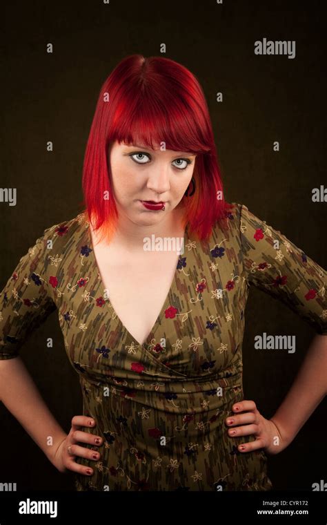 Pretty Punky Girl With Brightly Dyed Red Hair Stock Photo Alamy