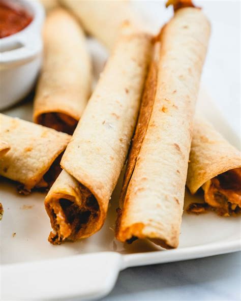 Easy Baked Flautas Taquitos A Couple Cooks