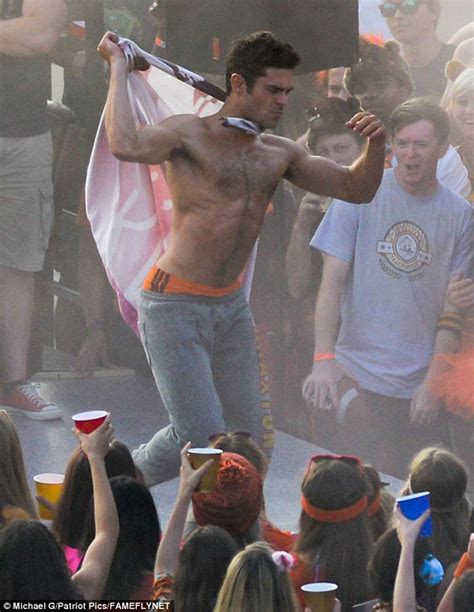 Zac Efron Strips Down Neighbors 2 While Seth Rogen Tries To Keep Up