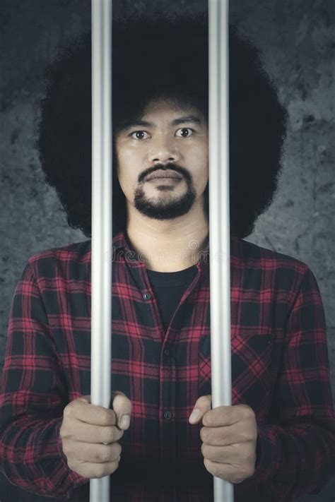 Young African American Man Behind Bars Stock Photos Free And Royalty