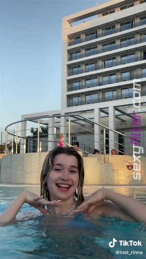 Sexy Rina Shows Cleavage In Blue Bikini Top At The Swimming Pool