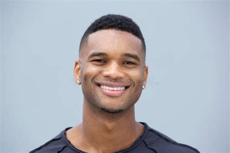 Close Up Portrait Of A Young Black Guy Smiling Stock Image Image Of