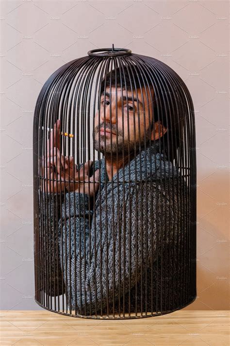 Man Locked In A Cage Stock Photo Containing Cage And Man People