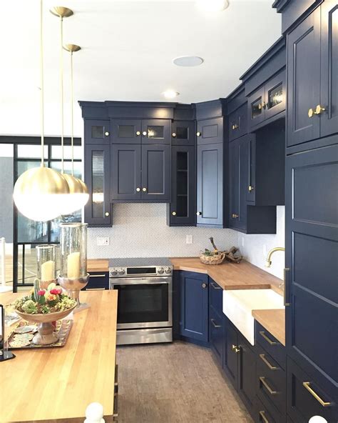 Kitchen in olive and dark wood kitchen interior kitchen design. Cassity Kmetzsch on Instagram: "Gorgeous navy blue kitchen ...