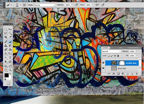 Use the grunge brush to paint inside the mask to hide some of the graffiti effect and to reveal the brick wall. How to Create a Graffiti Effect in Adobe Photoshop