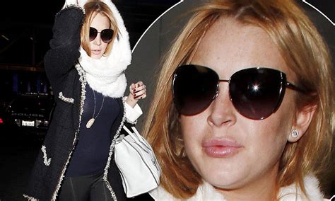 Lindsay Lohan Tries To Hide Her Puffy Face With Sunglasses Fails To