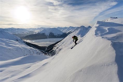 Skier Skiing In Peterson Creek In The Western Chugach Above Turnagain