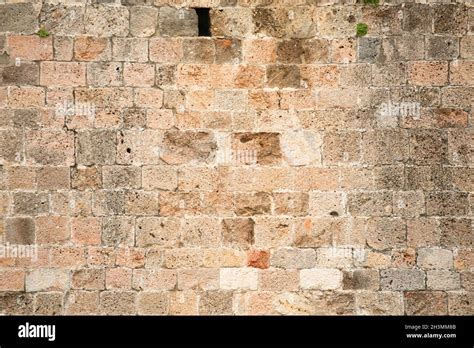 Limestone Wall Texture Wall Of An Old Building With A Small Window And