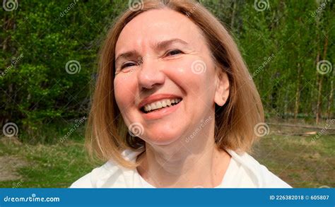 Positive Beautiful Mature Woman Face Mid Adult Lady Smiling Outdoors