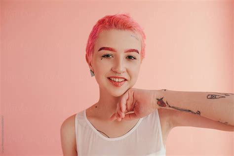 Smiling Gen Z Woman Looking At Camera By Stocksy Contributor Sergey