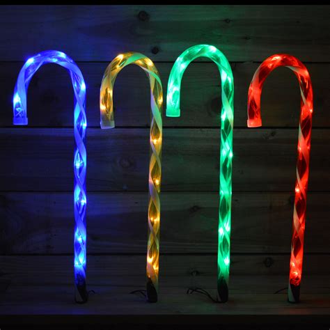 Set Of Four Premier 62cm Led Garden Candy Canes With 40 Lights And Ground