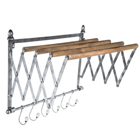 I enjoy decorating this shelf from hobby lobby. Galvanized Metal Wall Rack | Hobby Lobby | 1302165 | Galvanized metal wall, Laundry room wall ...