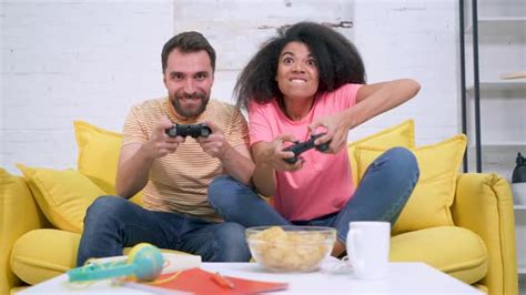 Couple Playing Video Games Together By Takefiveproduction Videohive