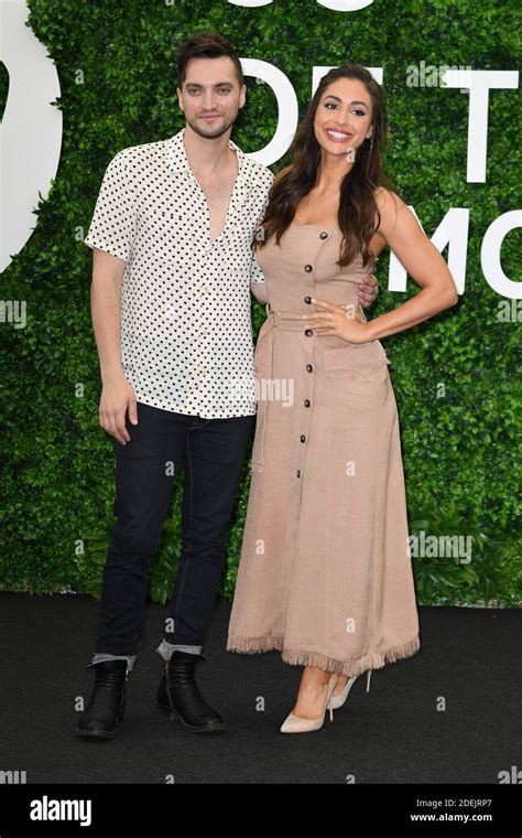 Richard Harmon And Lindsey Morgan From The Tv Serie The 100 Attend