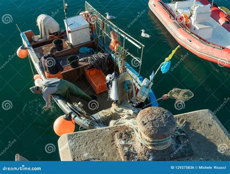Fisherman Clean His Fish On The Boat Editorial Photo Image Of Alone