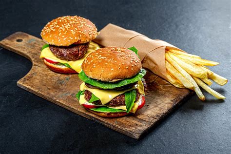 Fresh Burgers With Cold Drink And Fries On The Black Table Flip 2019