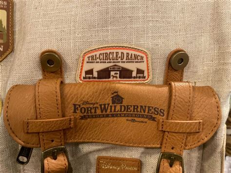 photos new loungefly canvas backpack celebrates 50 years of disney s fort wilderness resort