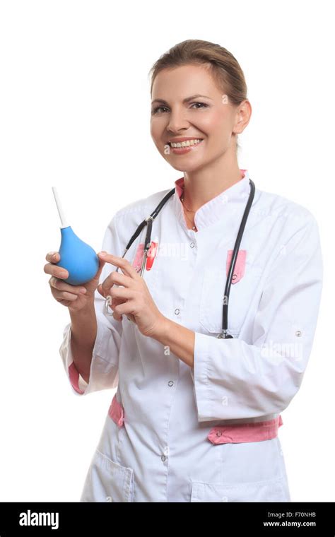 Happy Female Doctor Holding Enema Stock Photo Alamy