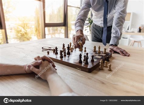 Businessman Playing Chess — Stock Photo © Sarkisseysian 158333592