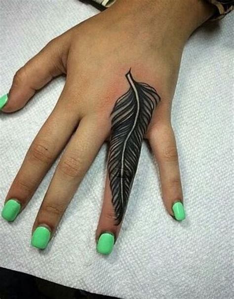 Beautiful Looking Feather Tattoo Designs With Their