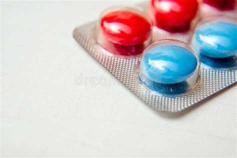 A Package Of Red And Blue Tablets Stock Photo Image Of Tablet Blue