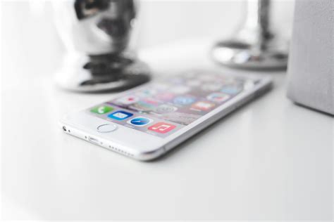 Apple Iphone 6 Plus On A White Desk · Free Stock Photo