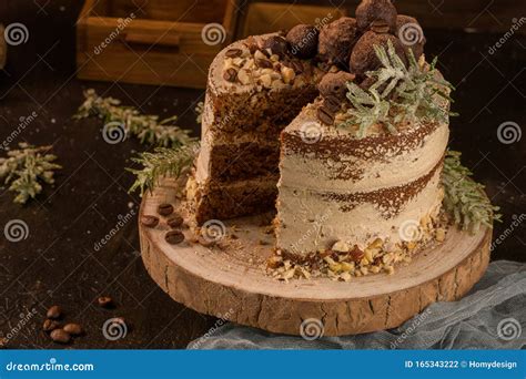 Slice Of Delicious Naked Coffee And Hazelnuts Cake Stock Photo Image